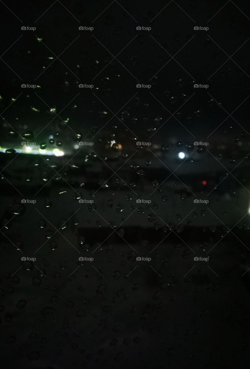 drops on the window. evening. winter. Russia