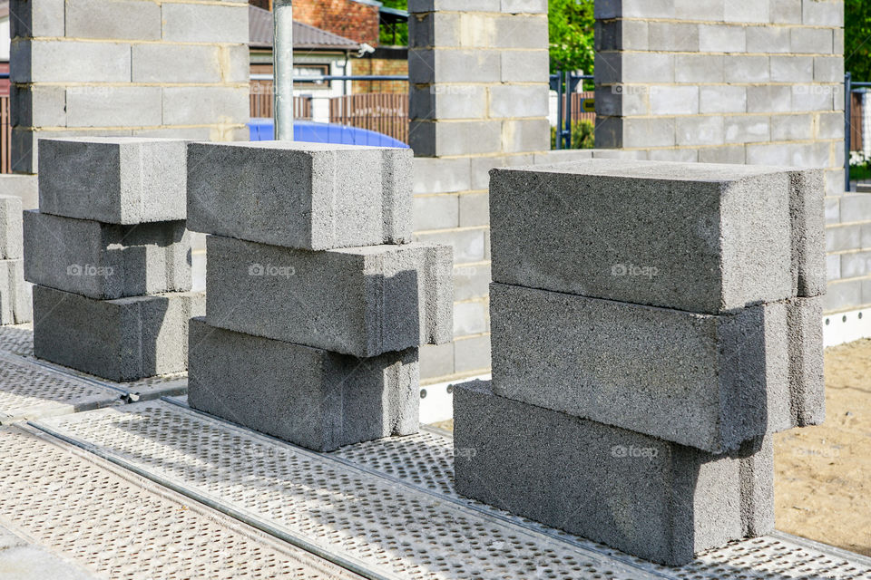 concrete foundation and wall construction of a new house, view of construction site in preparation proccess