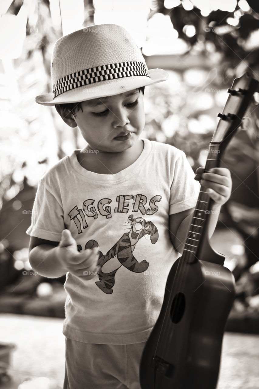 Young Guitarist. Thitiwin playing guitar