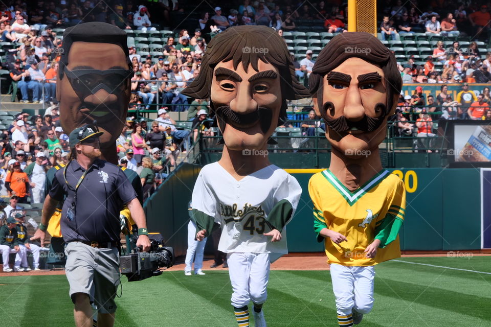 Oakland A's versus the San Francisco Giants during a Bay Bridge Series game on April 2nd, 2015. A little fun with character players running a race. 