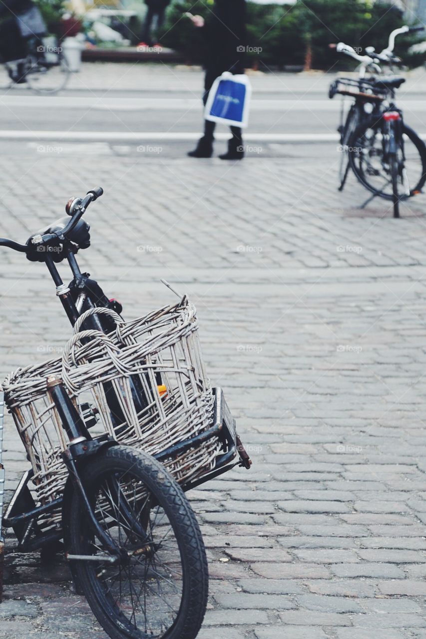 Black bicycle with old wooden basket