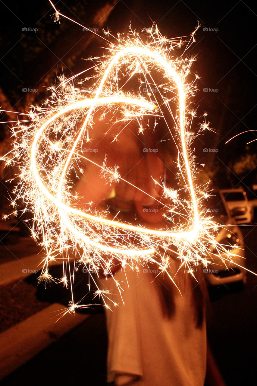 Closeup of heart shape sparkler