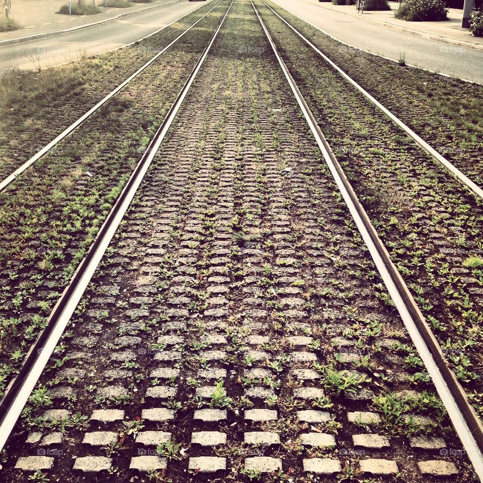 Street tram rails with vanishing point perspective