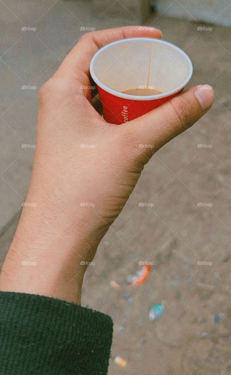 Enjoying tea at a tea stall.