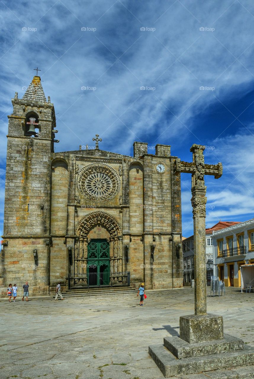 Church of San Martiño. Church of San Martiño and stone cross. Noia, Galicia, Spain.