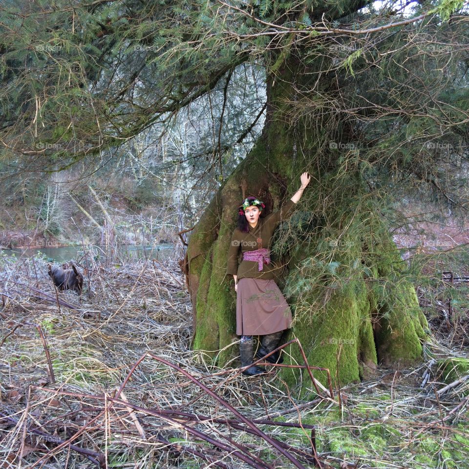 Faun costume. Woman as faun in woods