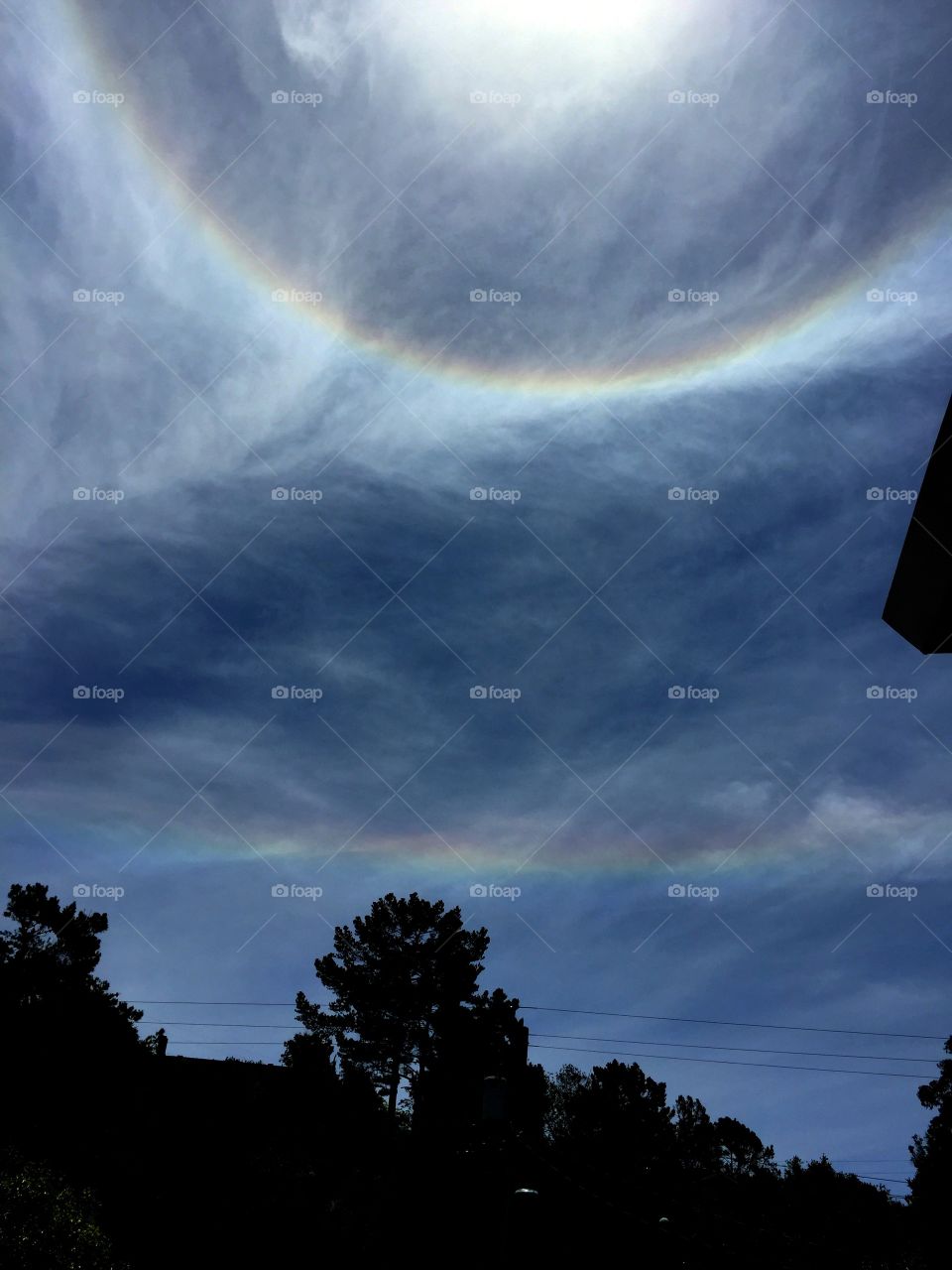 Live. A 22 degree halo and rainbow