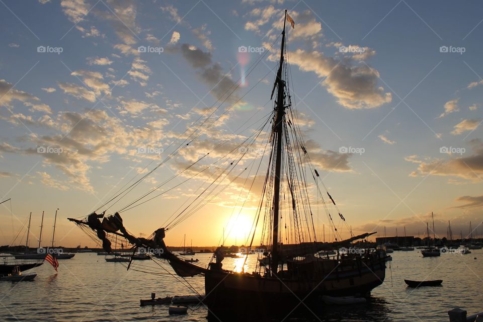 Fancy ship docked in the Narragansett Bay at sunset