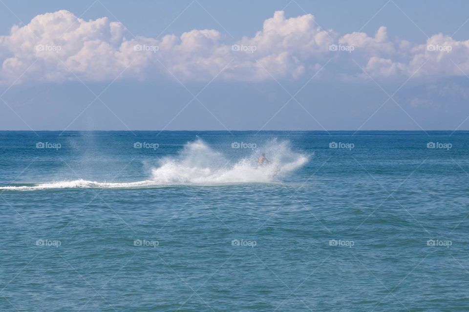 Beautiful view of blue sea and splash of water of jet 