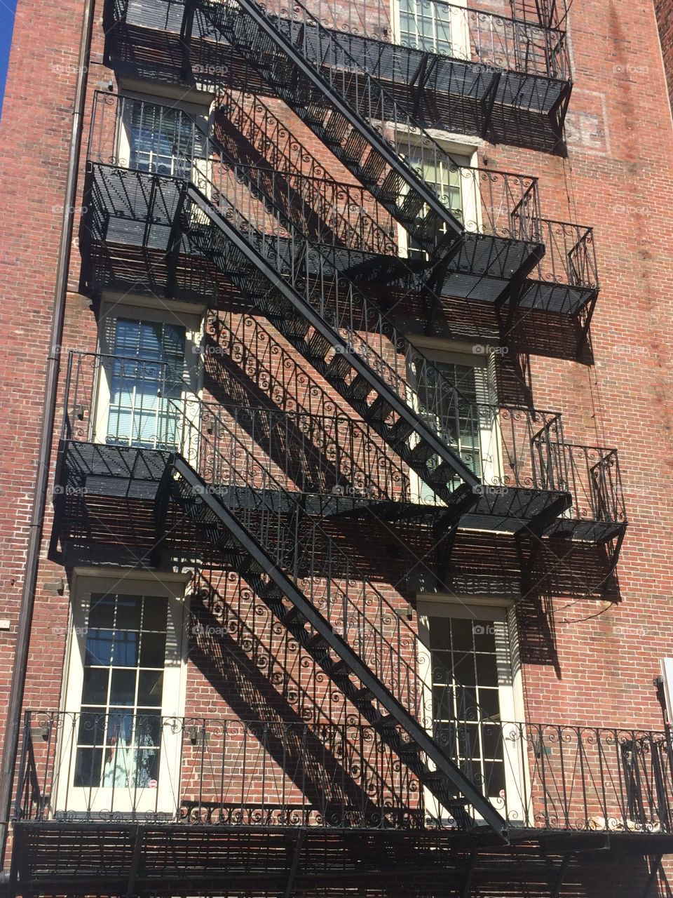 Outdoor wrought iron staircase fire escape Harvard