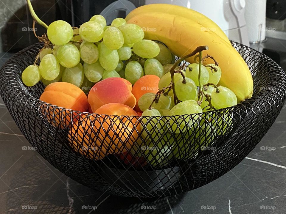 Fruit bowl with delicious seasonal fruits