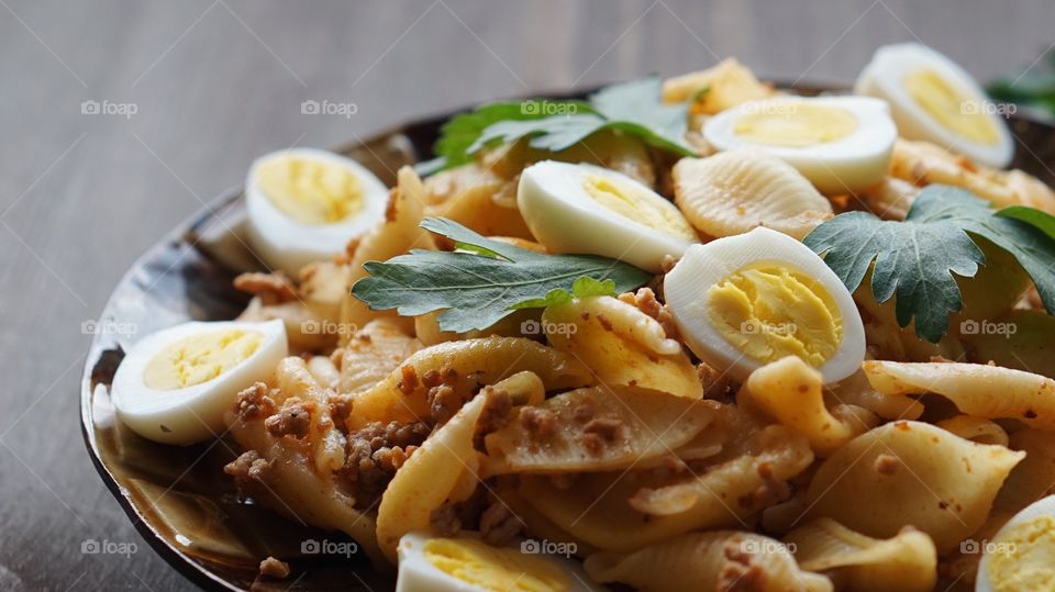 Close-up of pasta and eggs