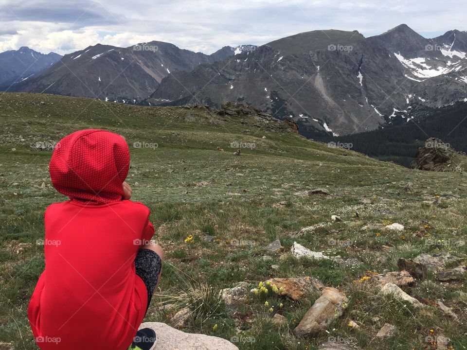 Taking time to take in the stunning view of the Rocky Mountains in Estes Park, CO.