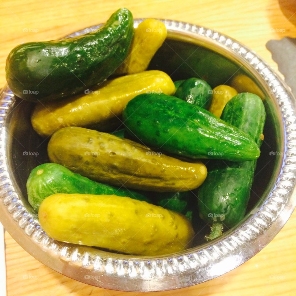 Pickles in vibrant tones of green