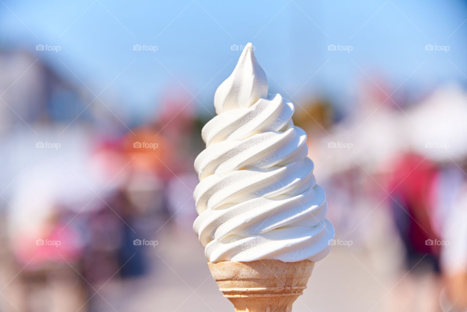 Soft serve ice cream cone at the Market Square in the center of Helsinki, Finland on hot day in July 2018. 