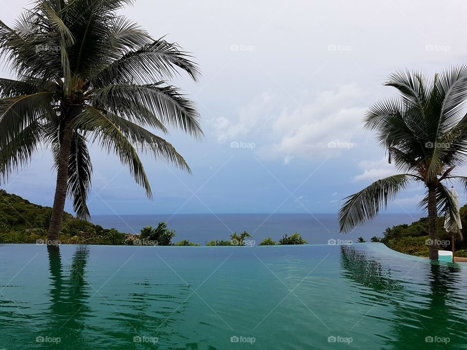 Ko Tao, Thailand. 
Infinity pool & Palm Trees.
This is the life!