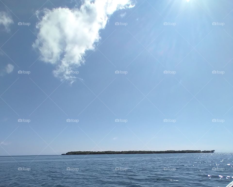 an island surrounded with water