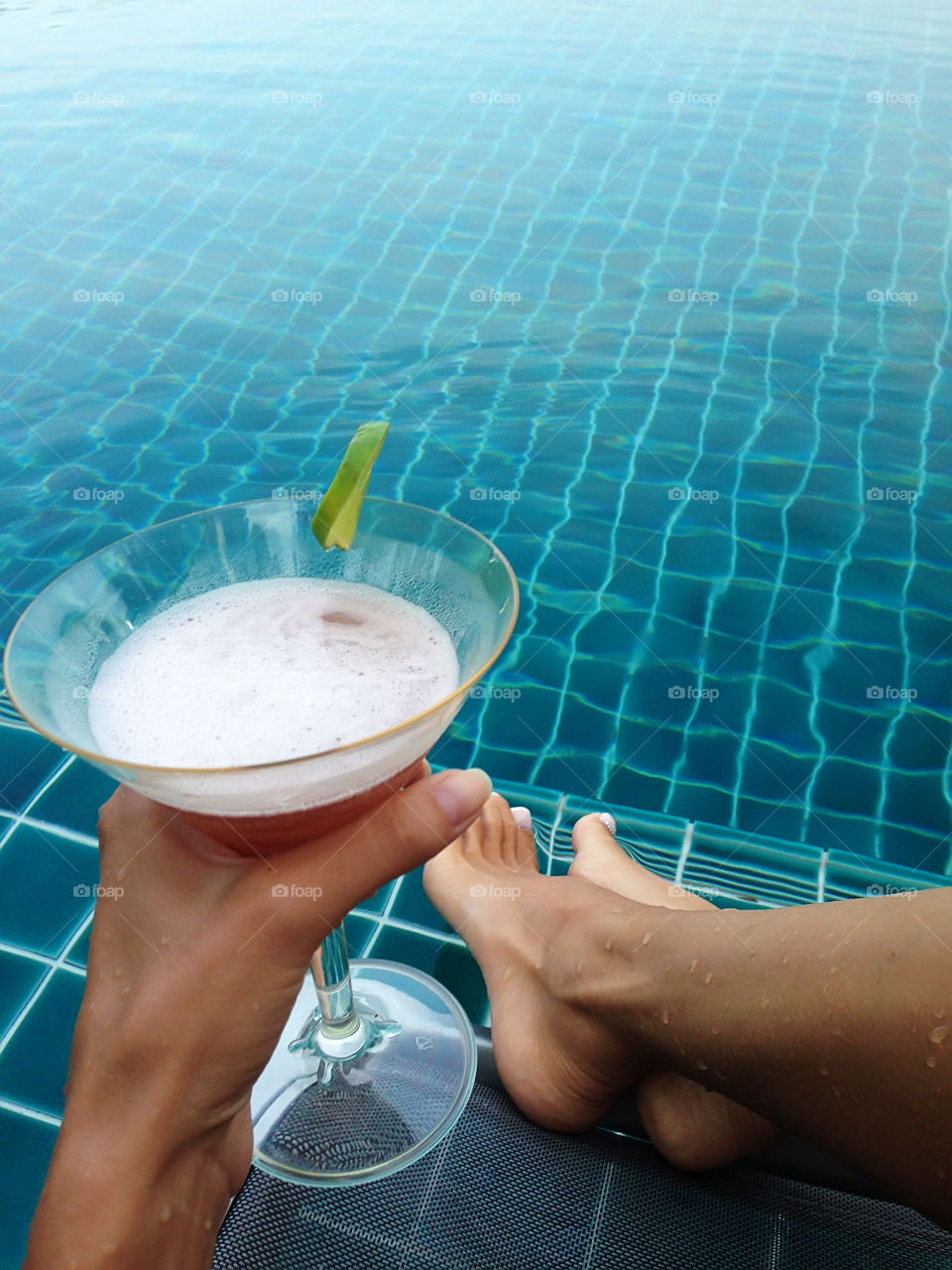 Summer relax by the swimming pool 