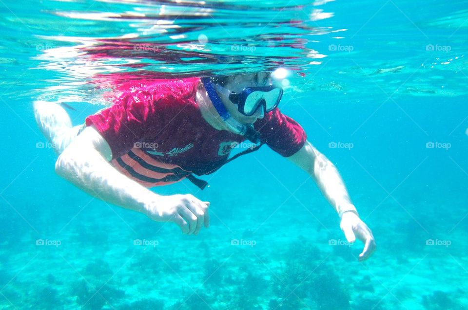 Snorkeling in blue waters