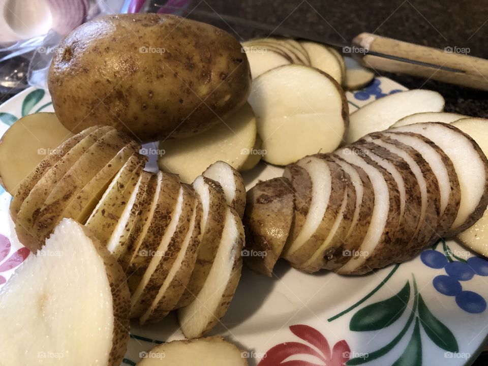 Sliced spuds ready to fry