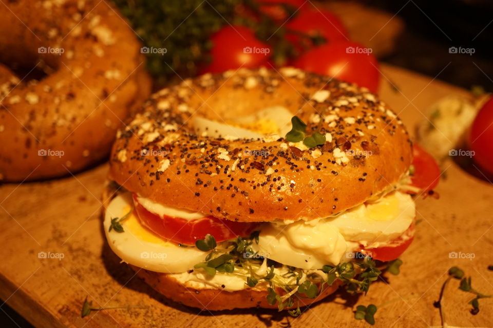 Egg and Cress with tomatoes and Mayo .. homemade bagel by me 😂