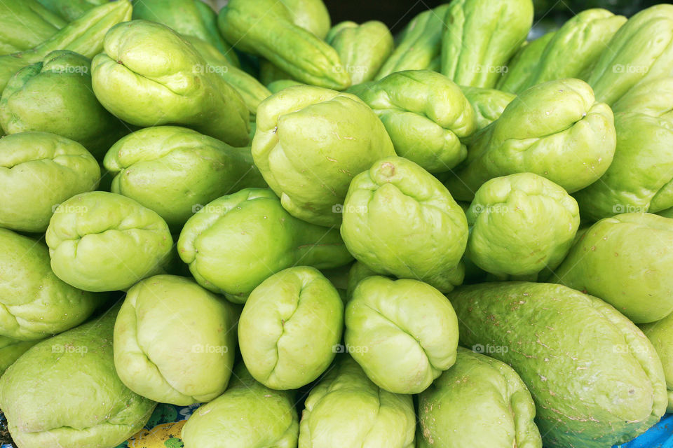 background of organic choko sechium edule vegetable pears