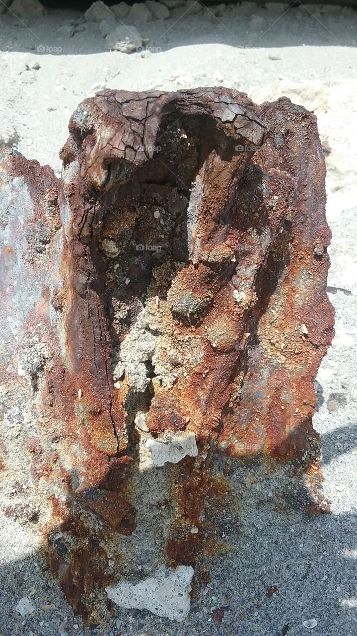 Rust exposed in concrete