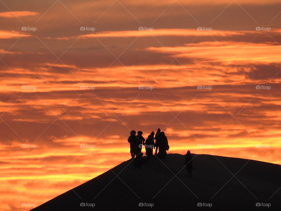 Watching the sunset in the dunes