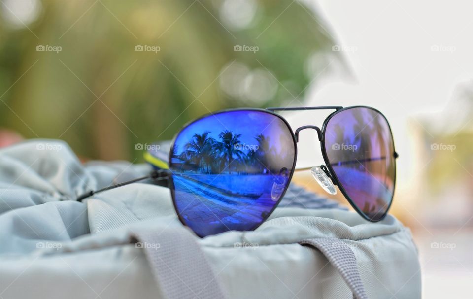 swimming pool reflection in sunglasses