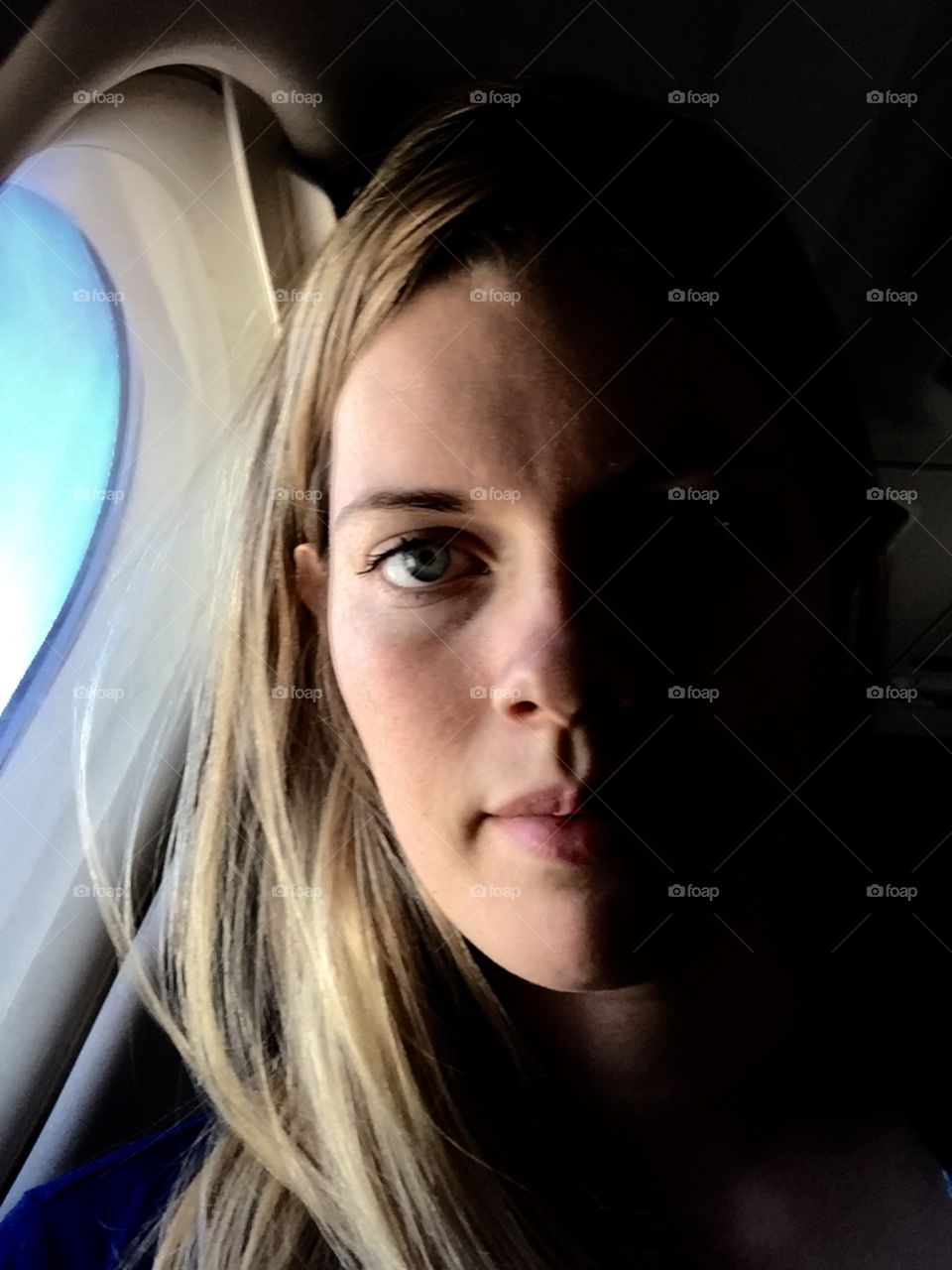 Woman on a plane 
