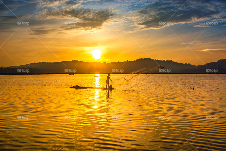 fishermen catch fish in the morning