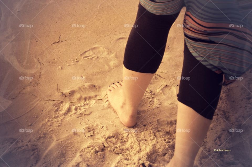 feet in the sand