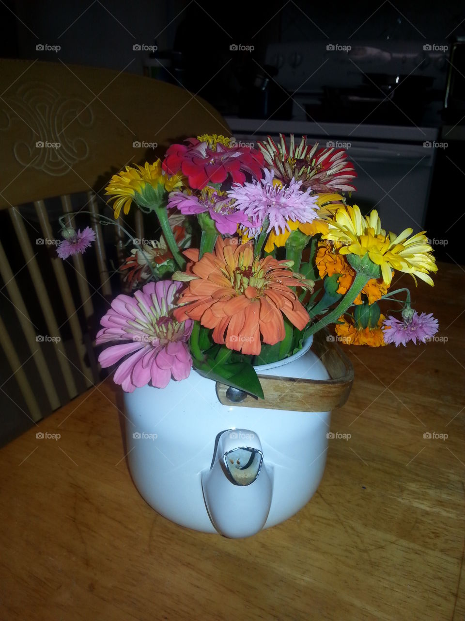 flowers in a teapot