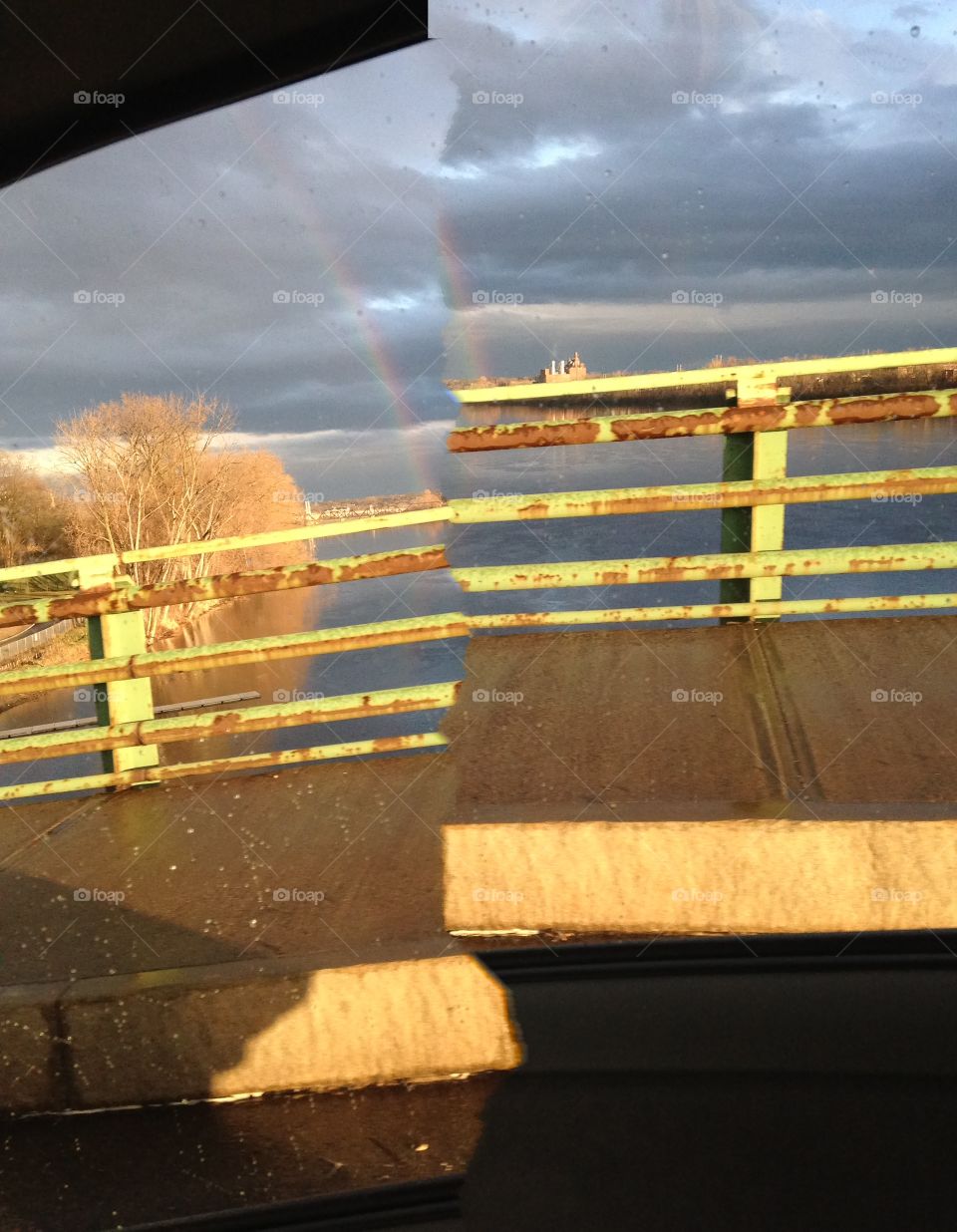 Driving home from work capturing a rainbow over the Connecticut River.
