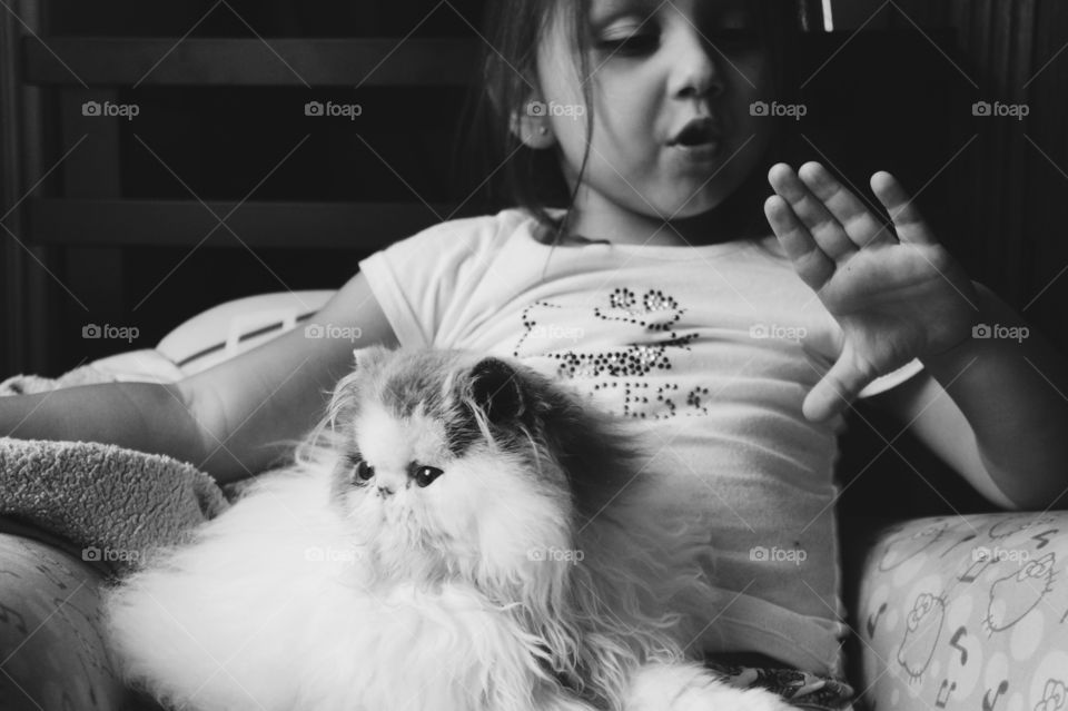 Girl sitting with a cat