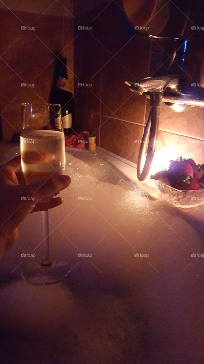 Romantic evening, dinner, champagne, strawberry, fruit, bath