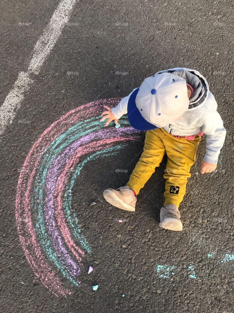 rainbow on asphalt