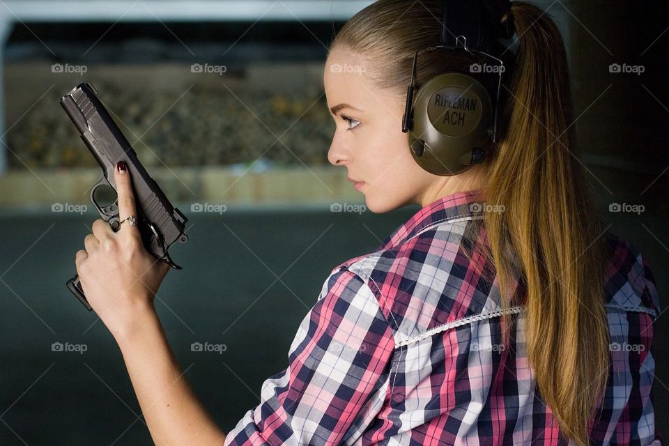Nastia with gun