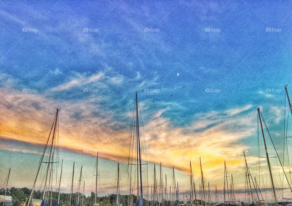 Sail masts at sunset 