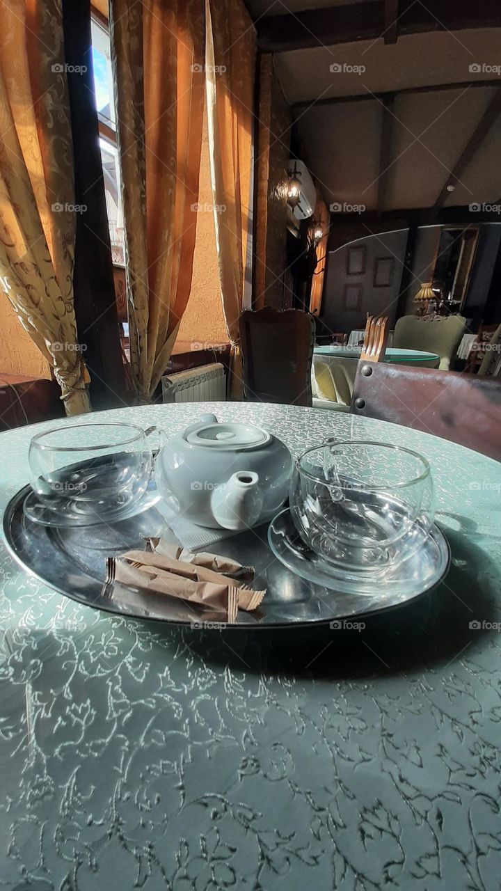 cup tea kettle and sugar on a tray Lunch