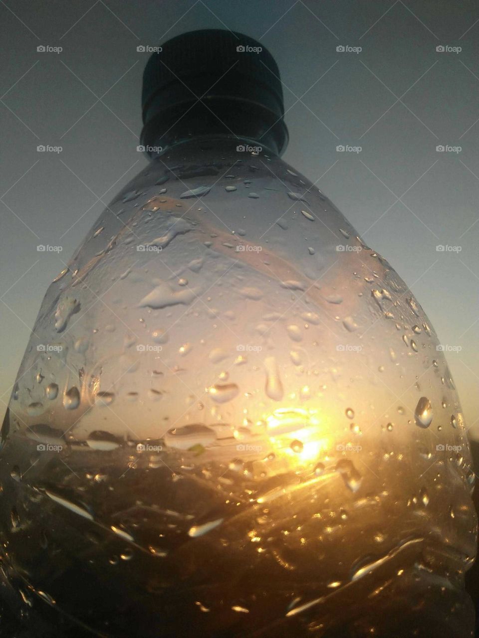 Small droplets into bottle.