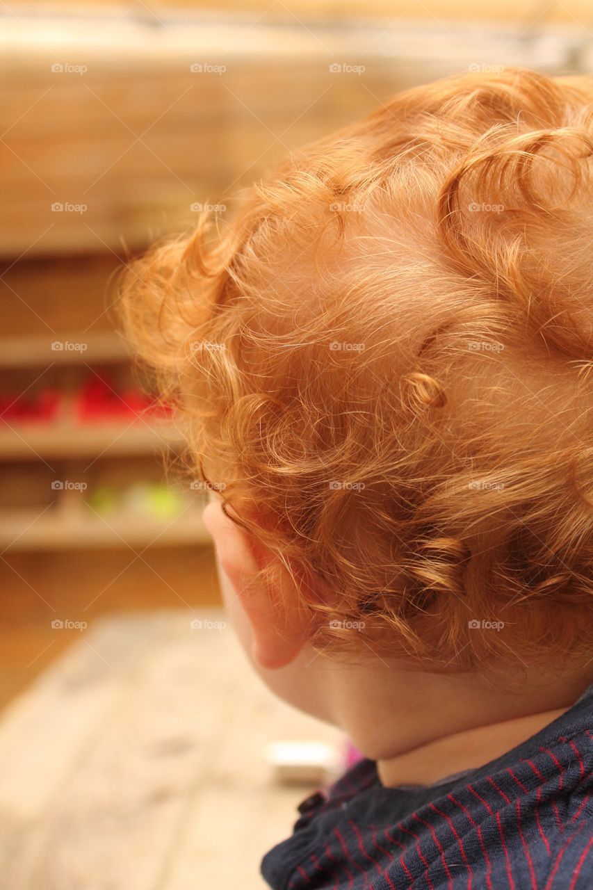 Close-up of a red haired toddler