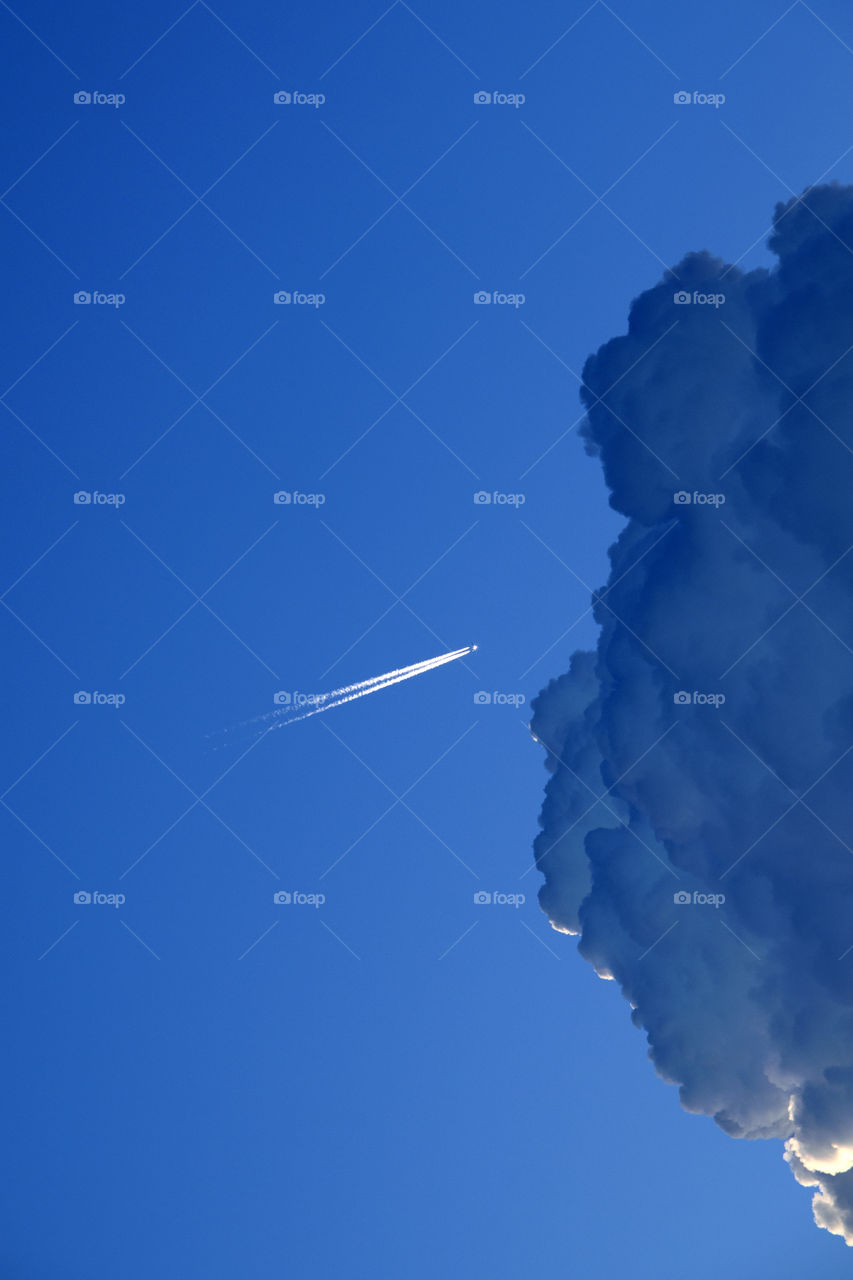 Air Plane against cloud and blue sky