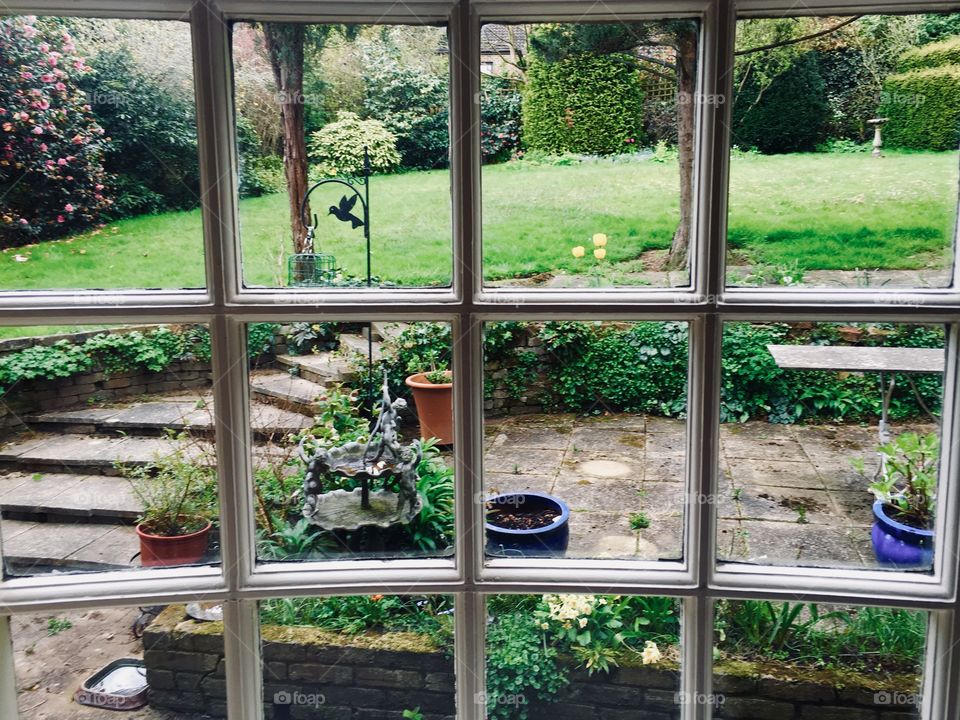 English country garden view from a window 