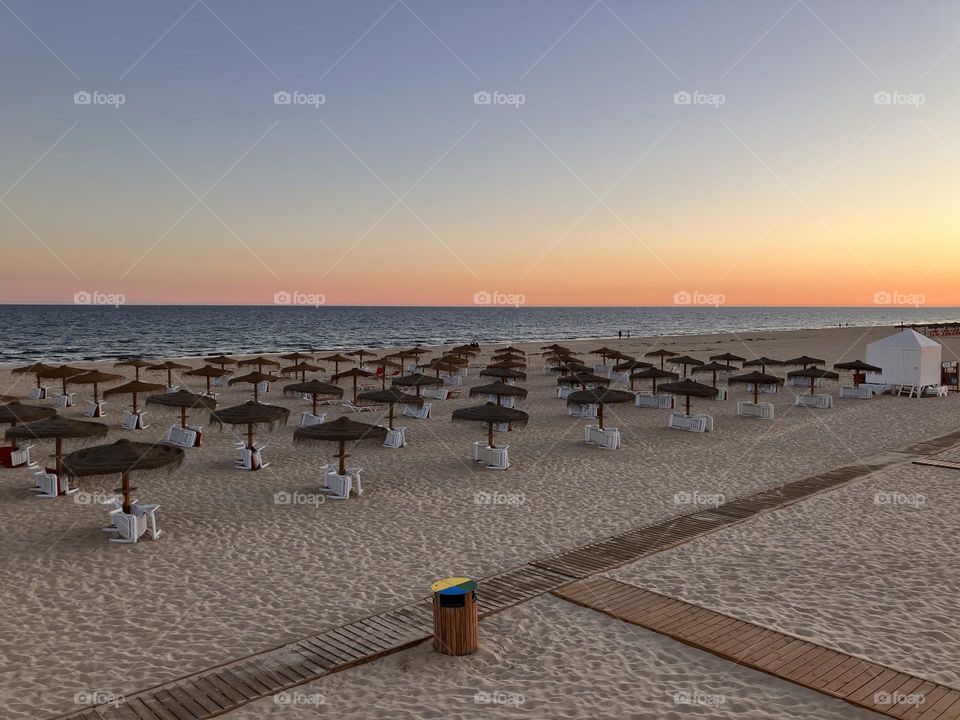 Geometry of lonely beach at sunset