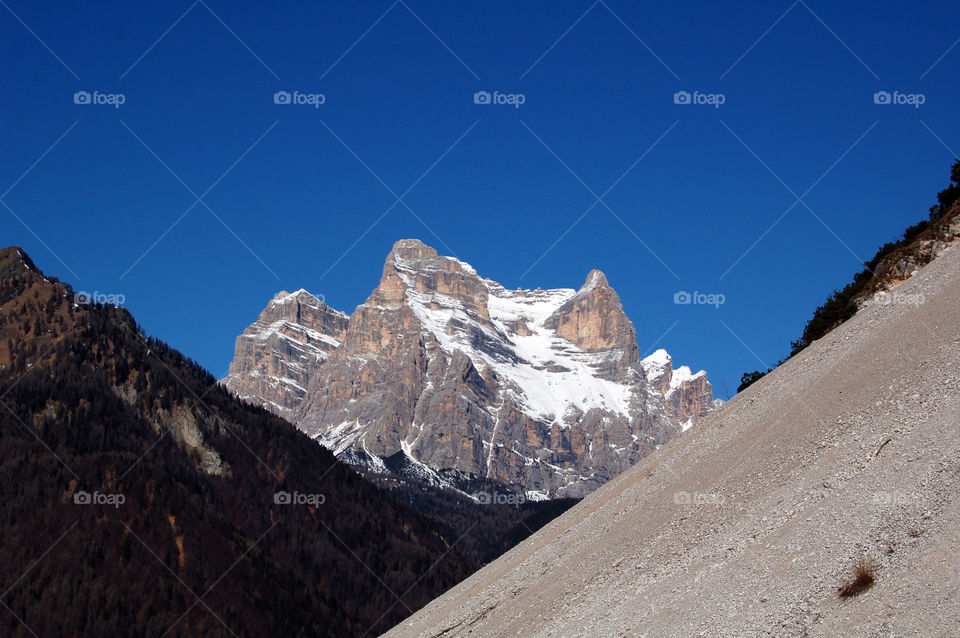 view of Mount Pelmo with snow in autumn, Dolomites, Italy