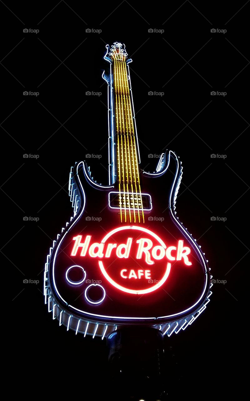 Hard Rock Cafe neon sign and logo