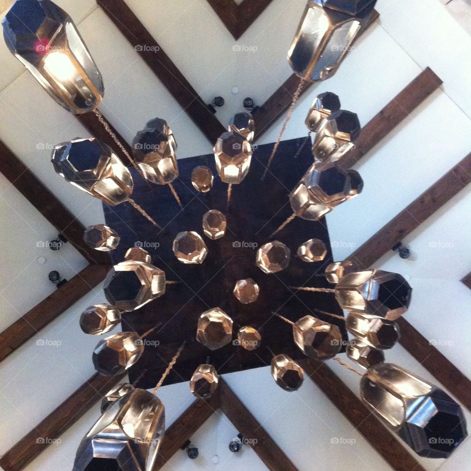 Under the candelabra . Standing under and looking up on the candelabra