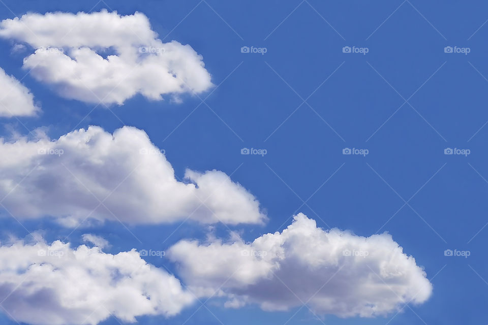 Cumulus clouds with blue sky background. Copy space is on the right side. Concept for  New Life Beginnings.