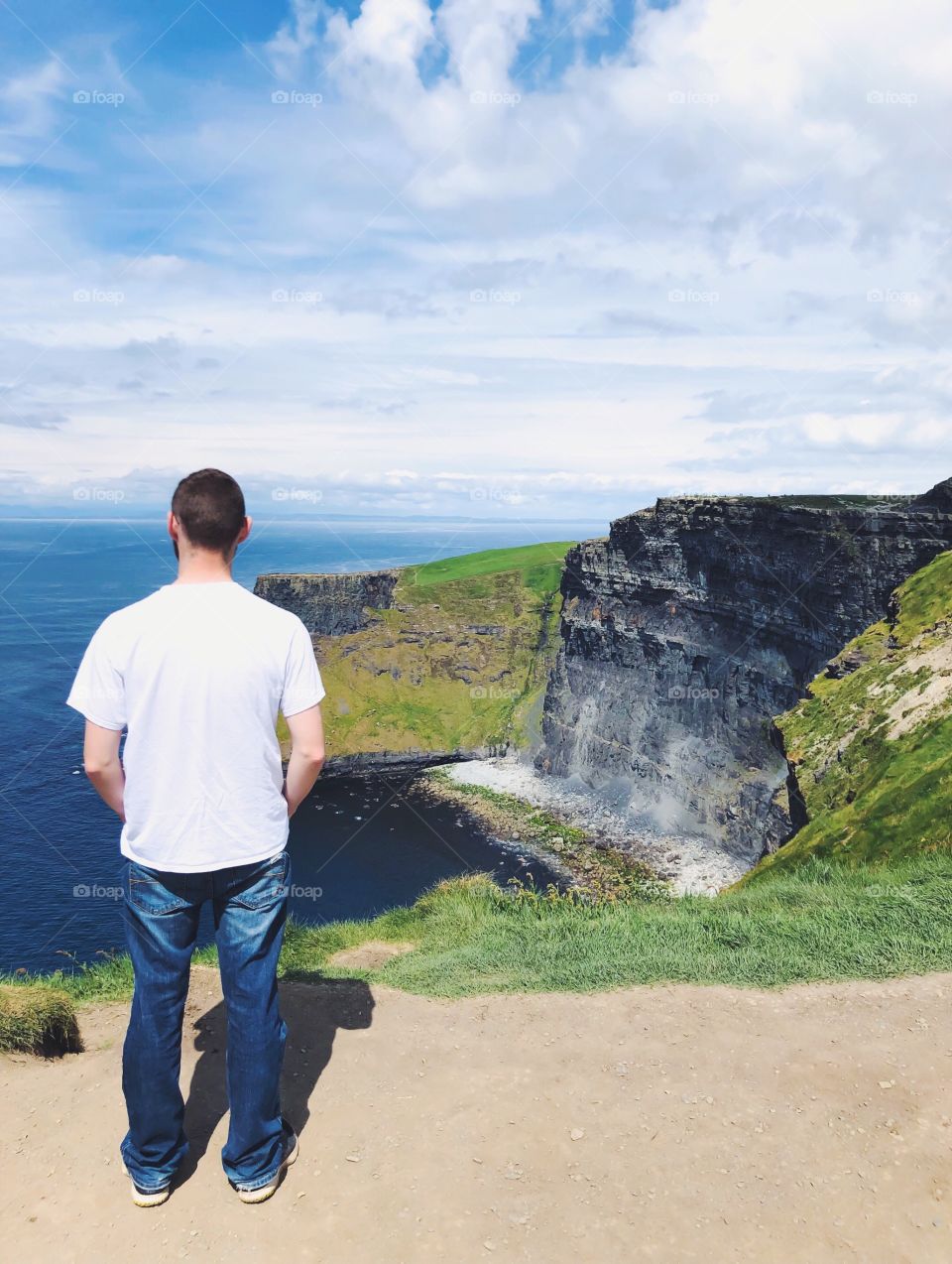Looking over the Cliffs of Moher, Ireland. Sometimes standing in the midst of a site that makes you feel so small enlarges your perspective.